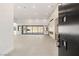 Bright and airy living room with sliding glass doors leading to the backyard at 6385 Leeland Ct, Las Vegas, NV 89149