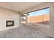 Covered patio with fireplace and backyard view at 6385 Leeland Ct, Las Vegas, NV 89149