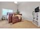 Charming bedroom with wood furniture and carpet at 6452 Casamar St, North Las Vegas, NV 89086