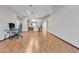 Bright living room with hardwood floors and kitchen view at 6452 Casamar St, North Las Vegas, NV 89086