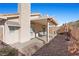 Relaxing backyard patio with covered pergola and seating at 6501 Grand Oaks Dr, Las Vegas, NV 89156