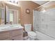 Clean bathroom with single vanity and tub shower combo at 6501 Grand Oaks Dr, Las Vegas, NV 89156