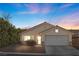 One-story house with attached garage, landscaping, and neutral color scheme at 6501 Grand Oaks Dr, Las Vegas, NV 89156