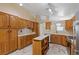 Bright kitchen featuring ample wood cabinetry and an island at 6501 Grand Oaks Dr, Las Vegas, NV 89156