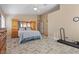 Bright bedroom with king-size bed and built-in shelving at 6501 Grand Oaks Dr, Las Vegas, NV 89156