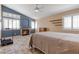 Spacious main bedroom with a king bed and fireplace at 6501 Grand Oaks Dr, Las Vegas, NV 89156