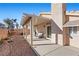 Covered patio with gravel yard and block wall at 6501 Grand Oaks Dr, Las Vegas, NV 89156