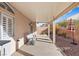 Covered patio with seating area and gravel landscaping at 6501 Grand Oaks Dr, Las Vegas, NV 89156