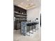 Modern bar area with sleek countertops, open shelving, and stylish seating at 665 Overlook Rim Dr, Henderson, NV 89012