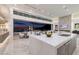 Modern kitchen with large island, sleek cabinetry, and city views at 665 Overlook Rim Dr, Henderson, NV 89012