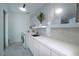 Clean laundry room with modern cabinetry and a sleek design at 665 Overlook Rim Dr, Henderson, NV 89012