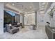 Open living area features a wine rack, comfortable seating, and a large picture window at 665 Overlook Rim Dr, Henderson, NV 89012