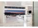 Open-concept living space with disappearing glass walls and amazing city views at 665 Overlook Rim Dr, Henderson, NV 89012