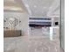 Bright living room showcases floor to ceiling windows and amazing city views at 665 Overlook Rim Dr, Henderson, NV 89012