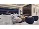 Modern living room boasts a linear fireplace, city views, and elegant decor at 665 Overlook Rim Dr, Henderson, NV 89012