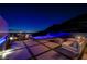 Modern patio with seating and city views at night at 665 Overlook Rim Dr, Henderson, NV 89012