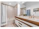 Main bathroom with double vanity and bathtub at 6908 Emerald Springs Ln, Las Vegas, NV 89113