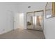 Bright bedroom with mirrored closet and access to hallway at 6908 Emerald Springs Ln, Las Vegas, NV 89113