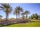 Spanish Trail community entrance with palm trees at 6908 Emerald Springs Ln, Las Vegas, NV 89113