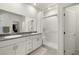 Modern bathroom with double vanity and a large walk-in shower at 74 Wildcat Ave, Pahrump, NV 89060