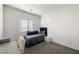 Bright bedroom with a twin bed, desk, and double door closet at 74 Wildcat Ave, Pahrump, NV 89060