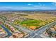 Aerial view of community featuring park, baseball field, and numerous homes at 7960 Brookside Falls Ct, Las Vegas, NV 89166