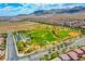 Aerial view of community park with baseball field and playground at 7960 Brookside Falls Ct, Las Vegas, NV 89166