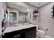 Clean bathroom with vanity, toilet and shower at 7960 Brookside Falls Ct, Las Vegas, NV 89166