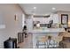 Modern kitchen with granite counters and stainless steel appliances at 7960 Brookside Falls Ct, Las Vegas, NV 89166