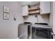 Well-equipped laundry room with modern washer and dryer at 7960 Brookside Falls Ct, Las Vegas, NV 89166