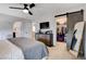 Main bedroom with dresser, sliding barn door to closet, and large mirror at 7960 Brookside Falls Ct, Las Vegas, NV 89166