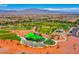 Aerial view of a vibrant playground with play structures at 7960 Brookside Falls Ct, Las Vegas, NV 89166