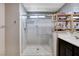 Large walk-in shower with built-in shelving at 7960 Brookside Falls Ct, Las Vegas, NV 89166