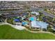 Aerial view showing community pool, park, and surrounding homes at 8130 Skye Sweep St, Las Vegas, NV 89166