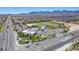 Aerial view of community amenities, including pool, park, and clubhouse at 8130 Skye Sweep St, Las Vegas, NV 89166