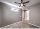 Spacious bedroom with hardwood floors and ceiling fan at 8130 Skye Sweep St, Las Vegas, NV 89166