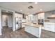 Modern kitchen with white cabinets and stainless steel appliances at 8130 Skye Sweep St, Las Vegas, NV 89166