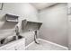 Laundry room with utility sink and shelving at 8130 Skye Sweep St, Las Vegas, NV 89166