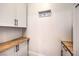 Laundry room with white cabinets and butcher block countertops at 8130 Skye Sweep St, Las Vegas, NV 89166