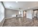 Open living room featuring hardwood floors and neutral walls at 8130 Skye Sweep St, Las Vegas, NV 89166