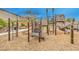 Community playground with modern equipment for children of all ages at 8130 Skye Sweep St, Las Vegas, NV 89166