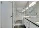 Double vanity bathroom with a large walk-in shower at 8424 Oyster Dr, Las Vegas, NV 89128