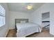 Bright bedroom with double bed, ceiling fan and access to upper floor at 8424 Oyster Dr, Las Vegas, NV 89128