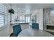 Dining area with round table and chairs, view into kitchen at 8424 Oyster Dr, Las Vegas, NV 89128