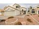 Two-story house with attached garage and landscaped yard at 8424 Oyster Dr, Las Vegas, NV 89128