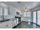 Updated kitchen featuring stainless steel appliances and granite countertops at 8424 Oyster Dr, Las Vegas, NV 89128