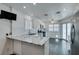 Modern kitchen with stainless steel appliances and granite countertops at 8424 Oyster Dr, Las Vegas, NV 89128