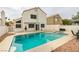 Beautiful backyard with a refreshing pool and spa at 8424 Oyster Dr, Las Vegas, NV 89128