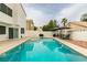 Inviting pool with spa and patio furniture, perfect for relaxation at 8424 Oyster Dr, Las Vegas, NV 89128