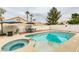 Relaxing pool and spa with patio furniture in the backyard at 8424 Oyster Dr, Las Vegas, NV 89128